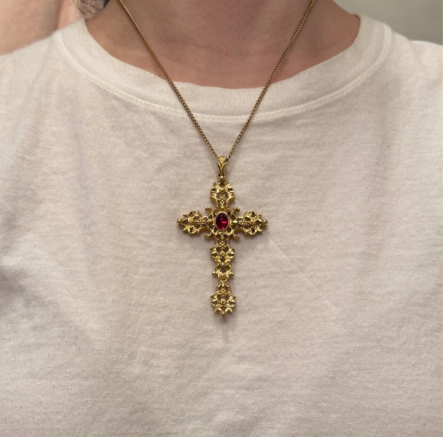 Vintage Avon Gold Tone Ornate Cross Necklace with Red Gemstone