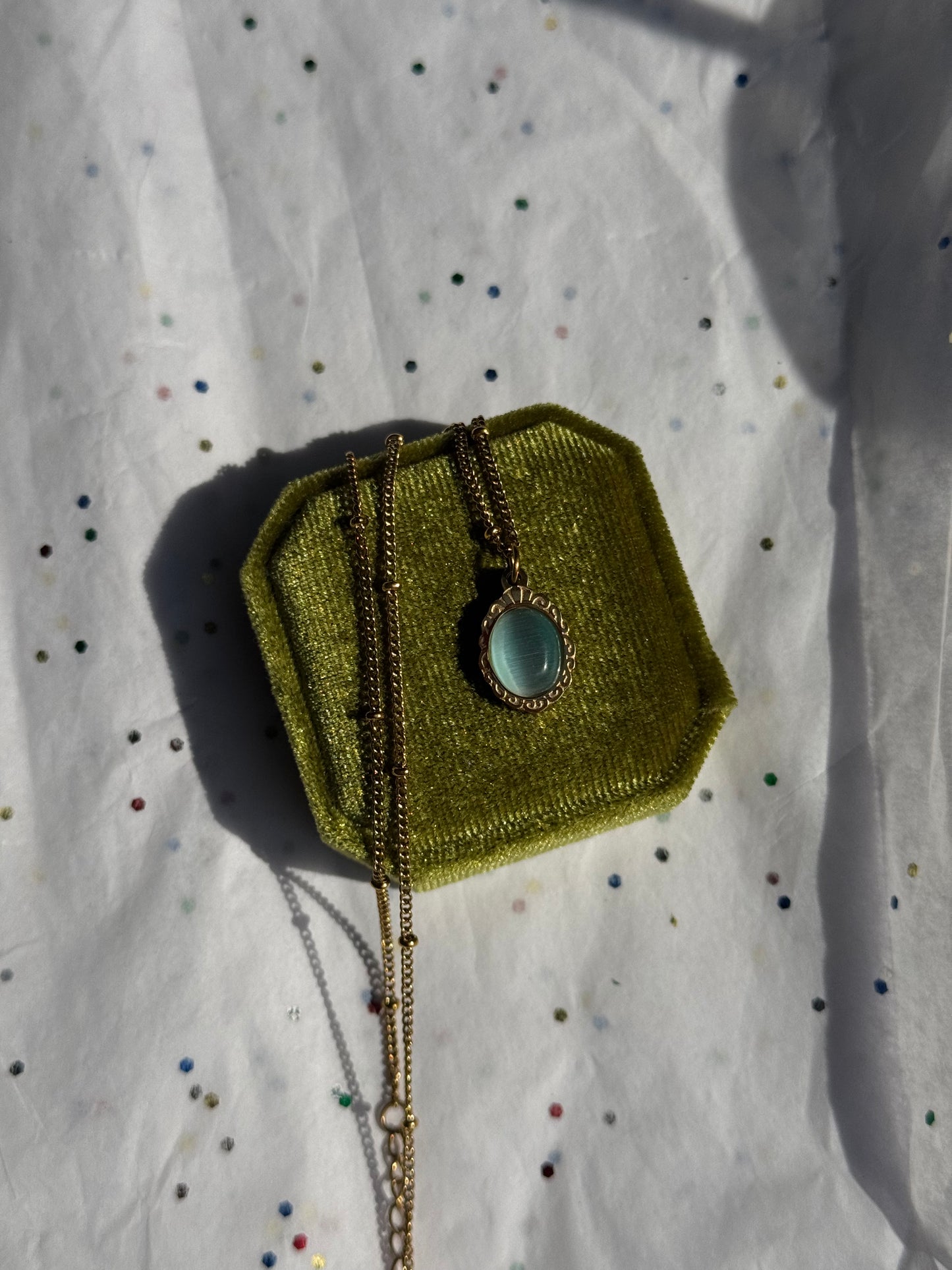 Gold Engraved Bezel Pendant Necklace with Blue Cabachon Stone