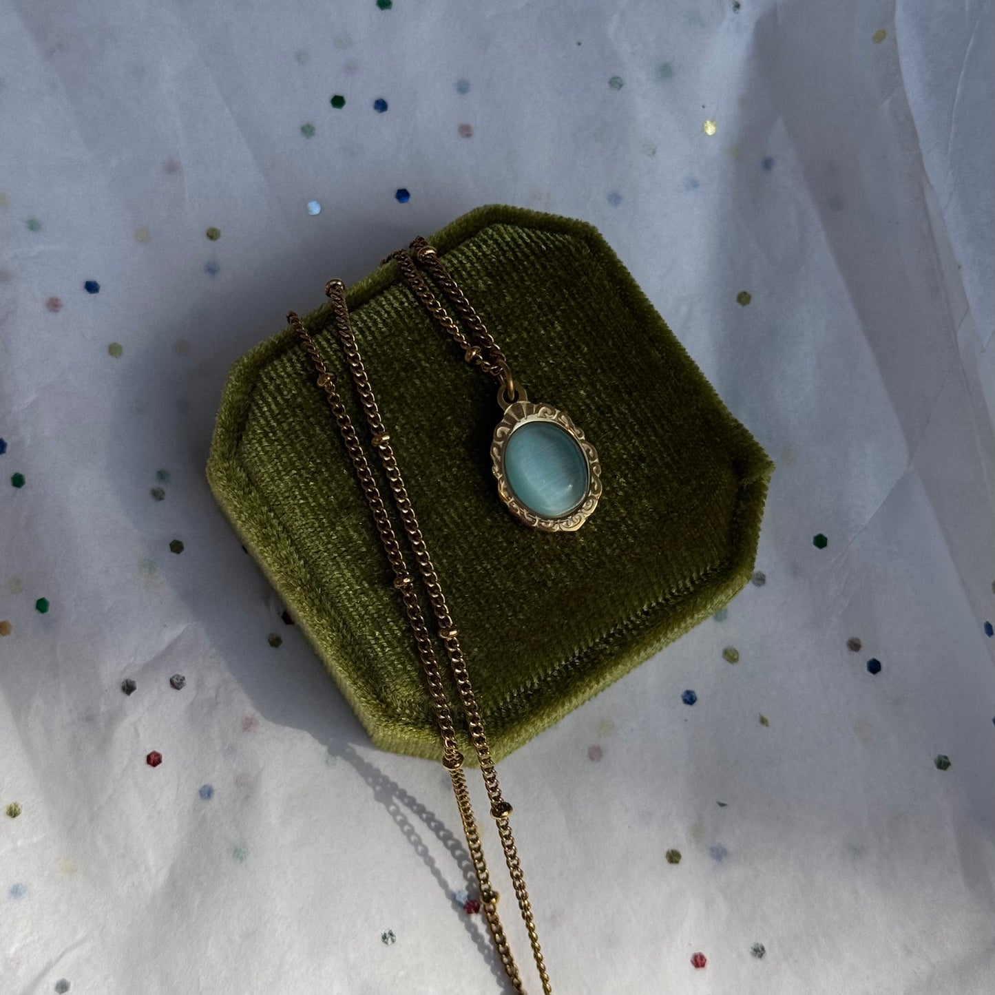 Gold Engraved Bezel Pendant Necklace with Blue Cabachon Stone