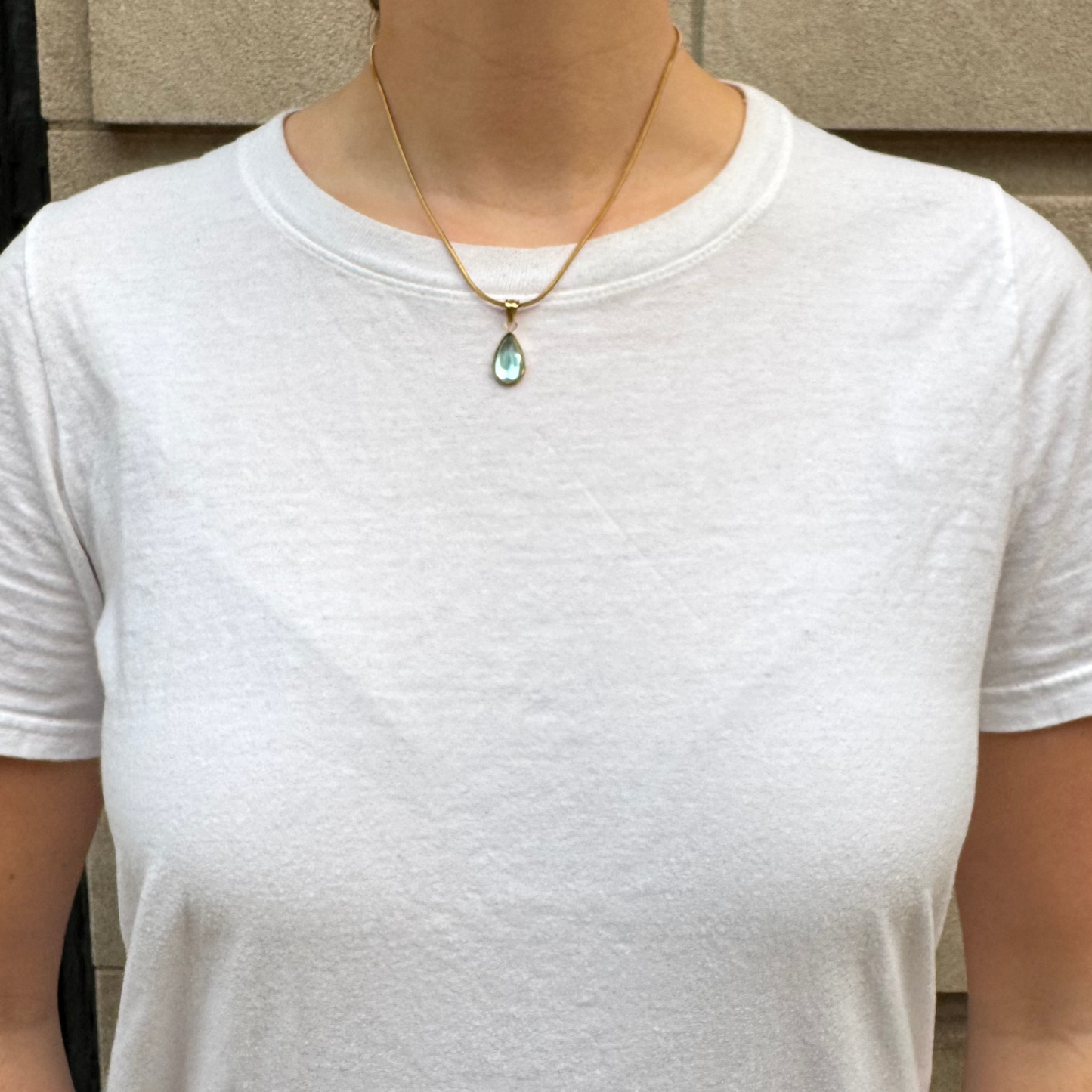 Gold Pendant Necklace with Blue Teardrop Stone