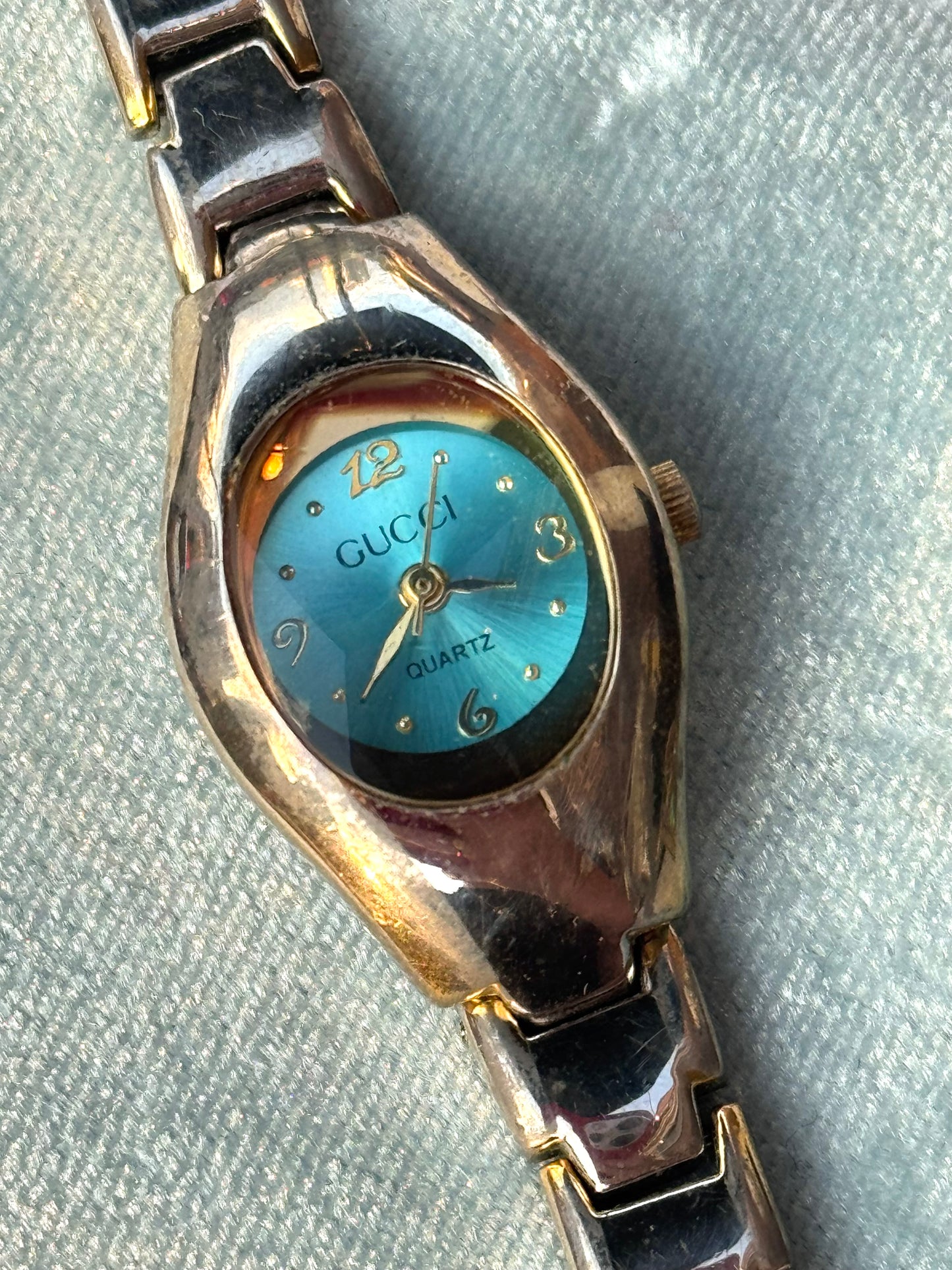 Vintage Gucci Silver and Gold Bubble Watch with Teal Face
