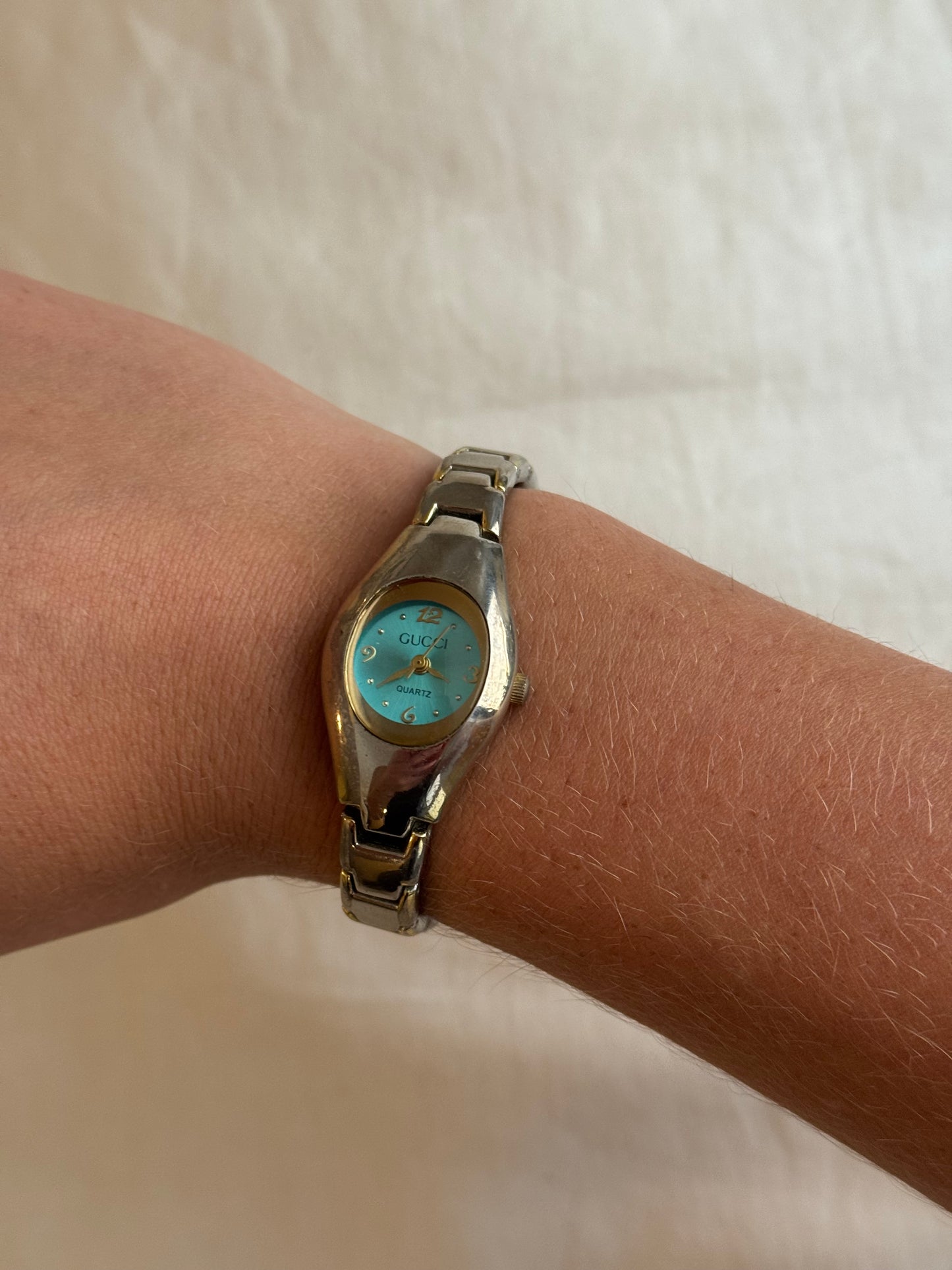 Vintage Gucci Silver and Gold Bubble Watch with Teal Face