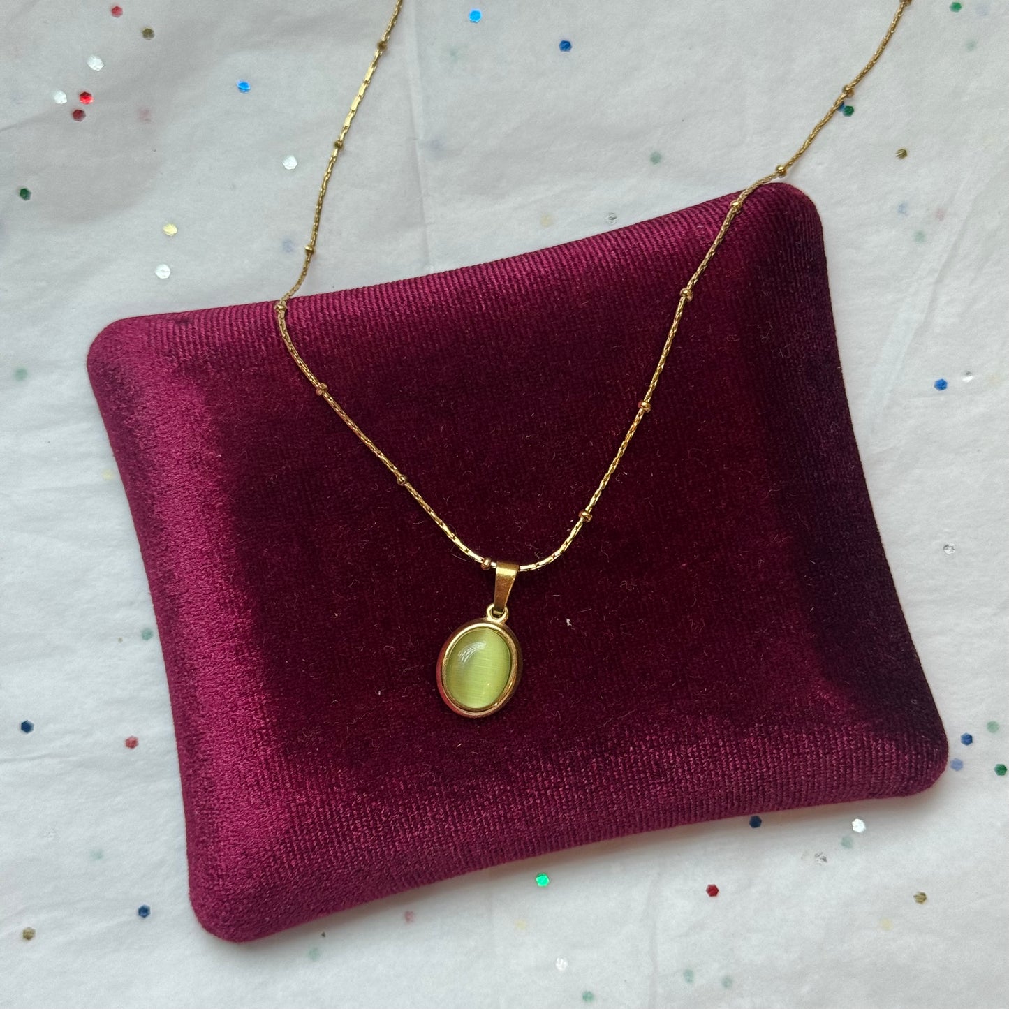 Gold Pendant Necklace with Green Cabochon Stone