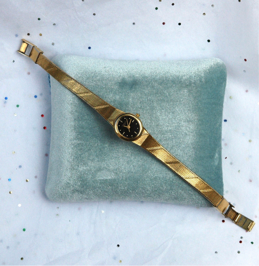 Vintage Gold Caravelle Watch with Black Face