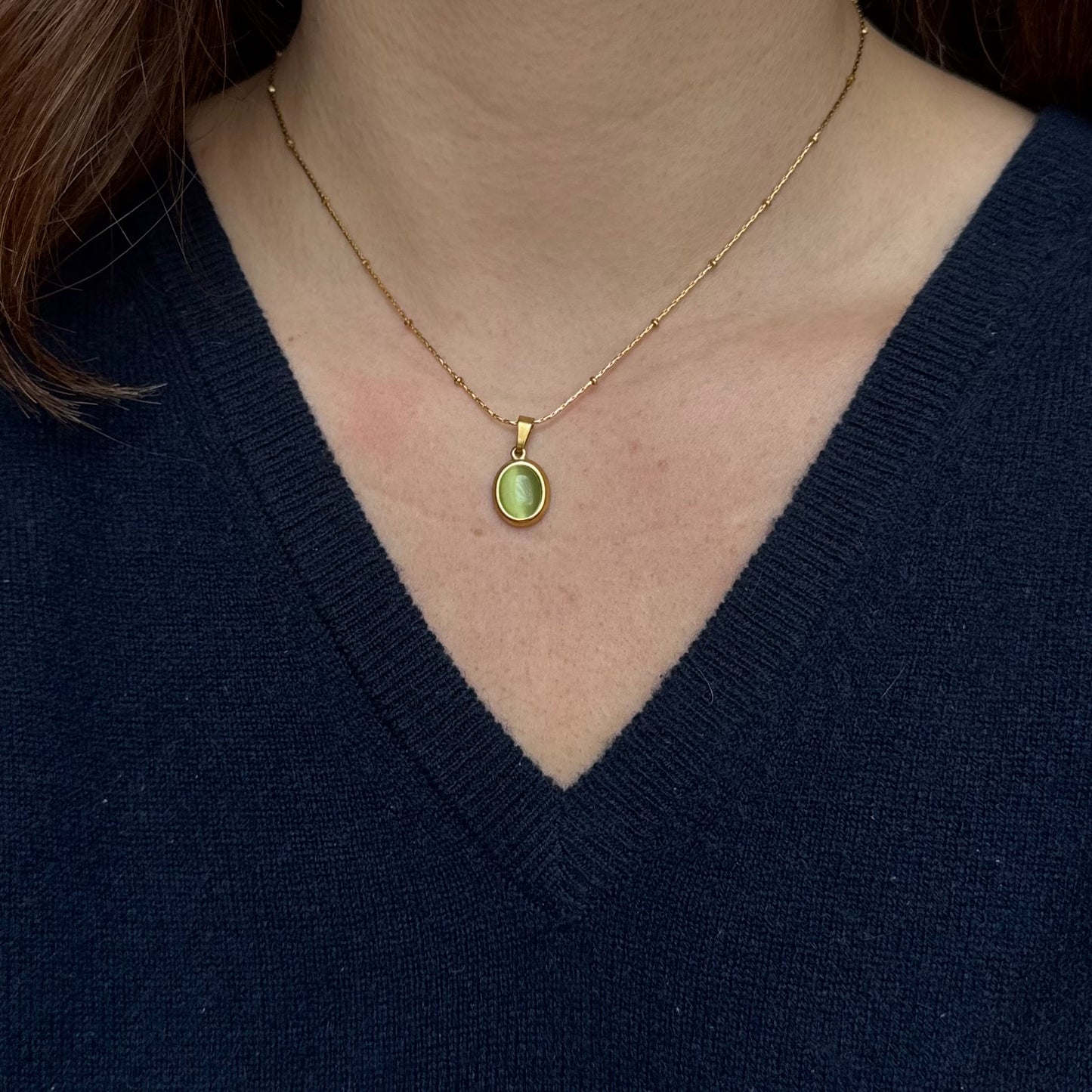 Gold Pendant Necklace with Green Cabochon Stone