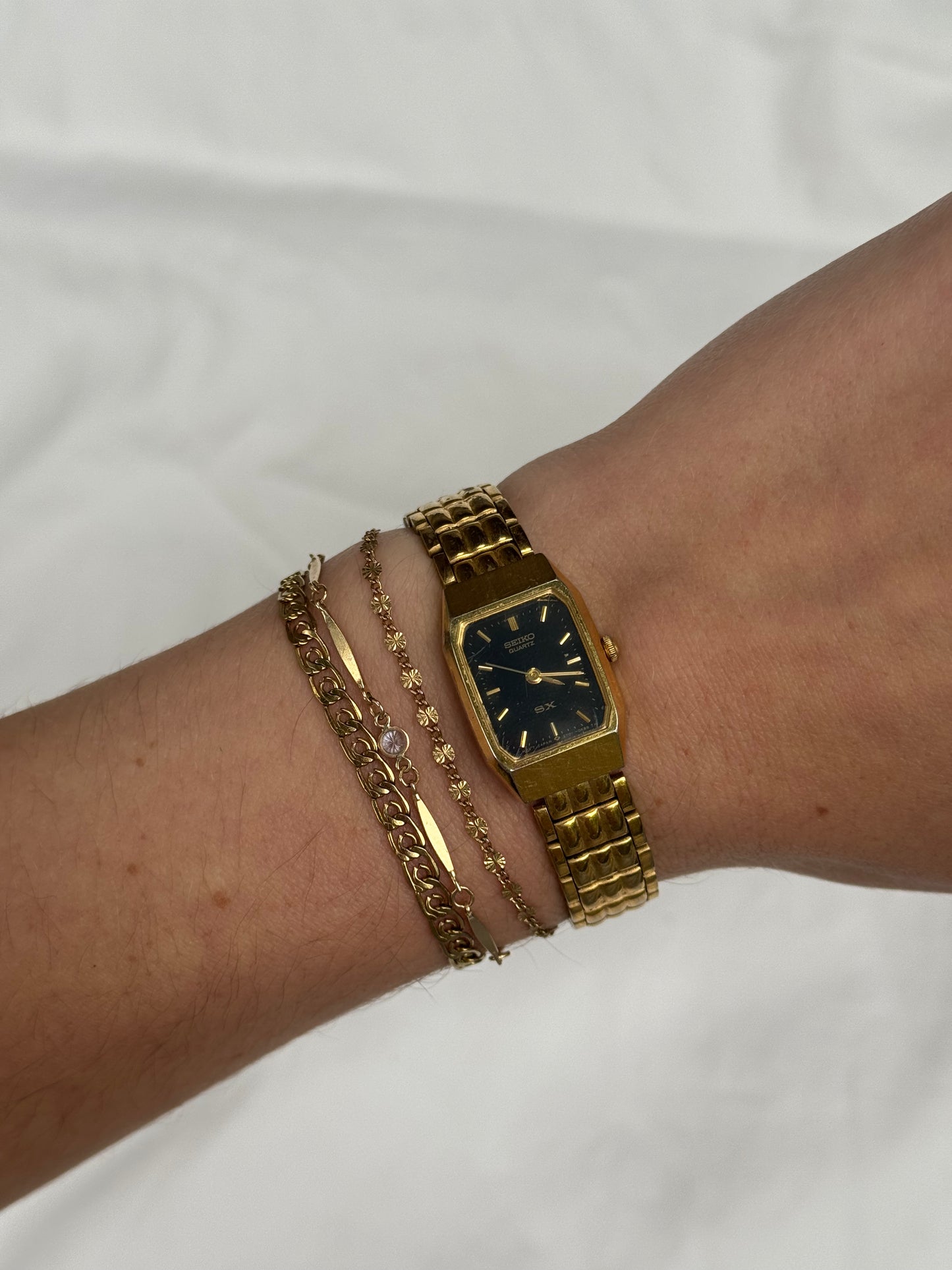 Vintage Gold Seiko Watch with Black Rectangular Face