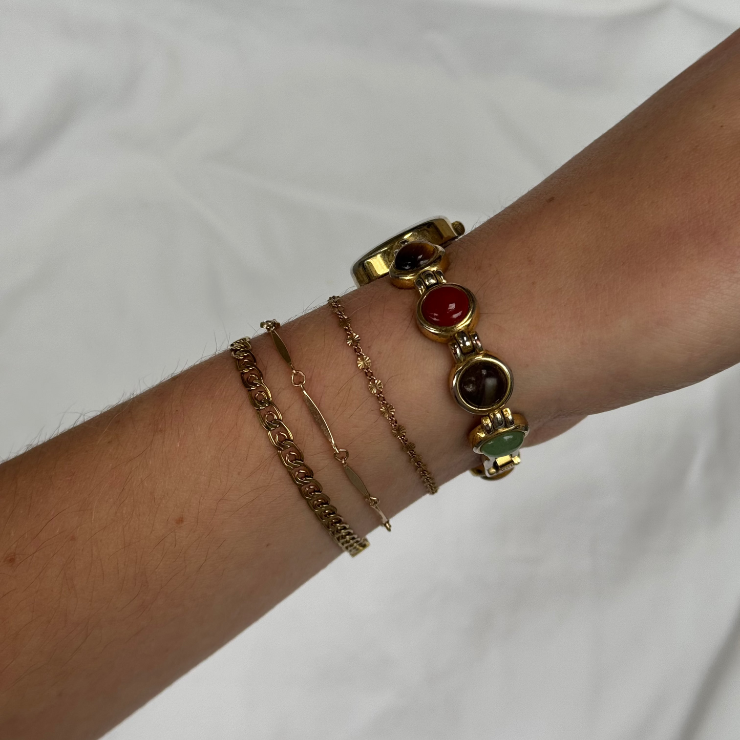 Vintage Gold Tone Watch with Multicolored Stones