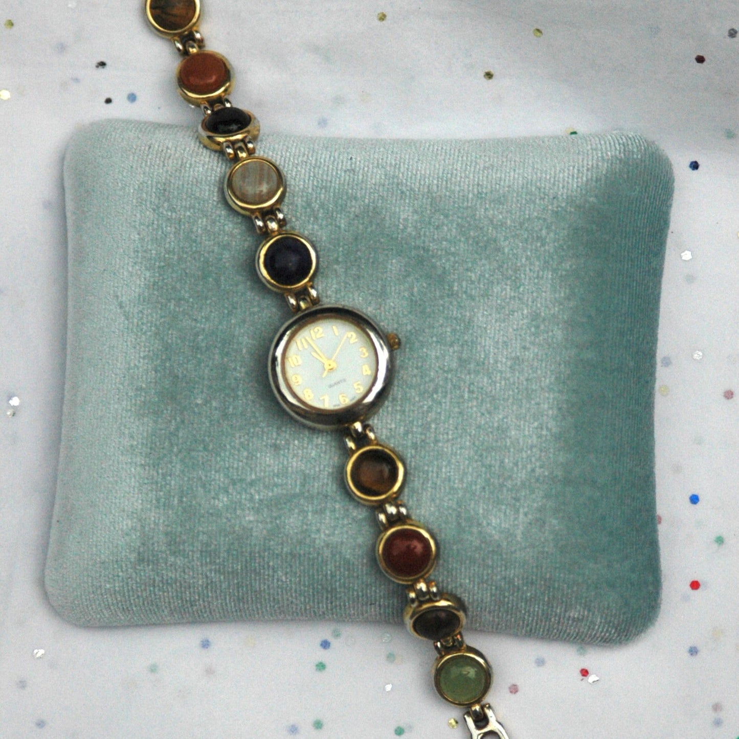 Vintage Gold Tone Watch with Multicolored Stones